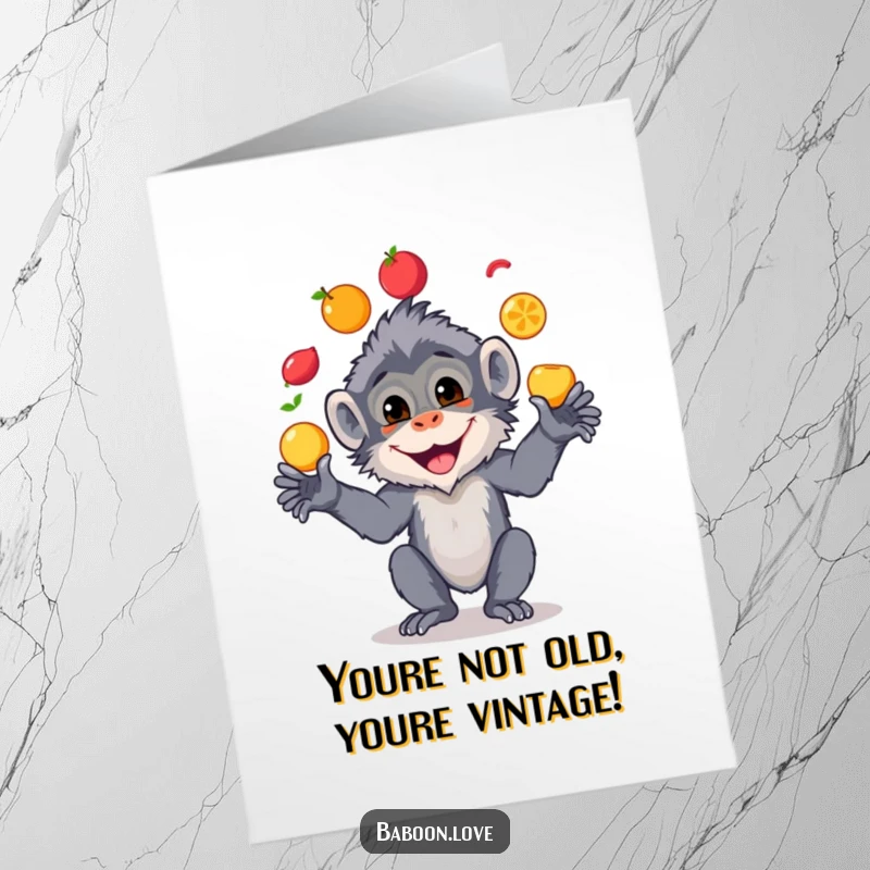 Funny Free Printable Birthday Card featuring a cheerful baboon with a huge grin, skillfully juggling colorful fruits as a birthday surprise.