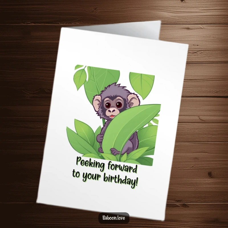 Funny Free Printable Birthday Card: A curious baboon peeking from behind lush jungle foliage, eyes wide with intrigue.