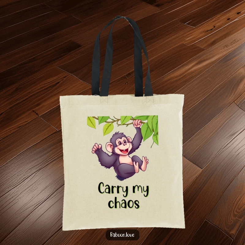 Funny tote bag featuring a mischievous baboon sliding down a vine with pure glee, perfect for carrying essentials with style.