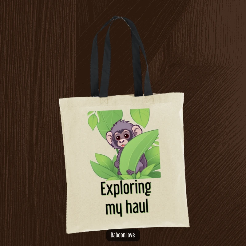 Funny Tote Bag: A curious baboon peeks from a tropical plant, making a humorous and practical accessory for carrying everyday items.